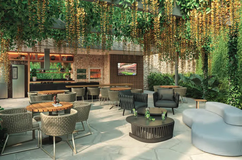 Churrasqueira e fornos de pizza com jardim vertical no Claris Casa & Clube